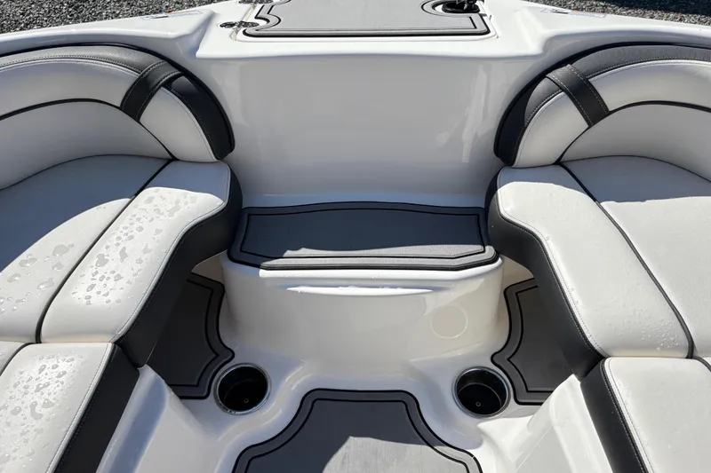 Slide: The Image of 2013 Yamaha Boats AR240 HO interior seating with sleek design and water droplets. - 13