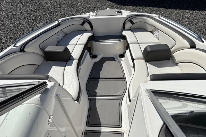 Slide: The Image of 2013 Yamaha Boats AR240 HO interior with spacious seating and sleek design. - 9