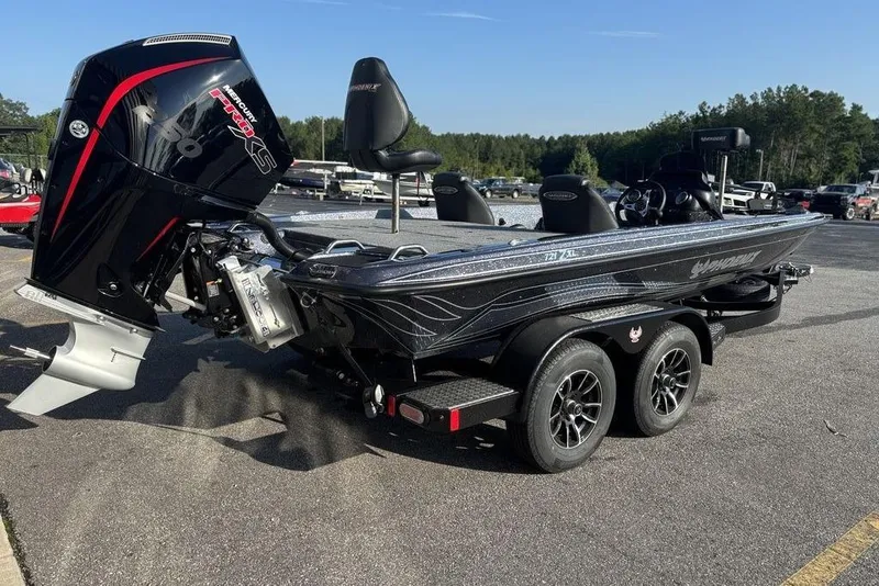 Slide: The Image of 2026 Phoenix 721 ZXL boat with powerful outboard motor on a trailer. - 1