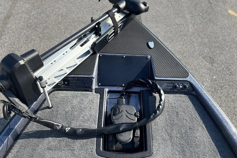 Slide: The Image of 2026 Phoenix 721 ZXL boat deck with trolling motor and control panel. - 12