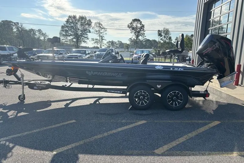Slide: The Image of 2026 Phoenix 721 ZXL boat on trailer in parking lot, sunny day. - 3