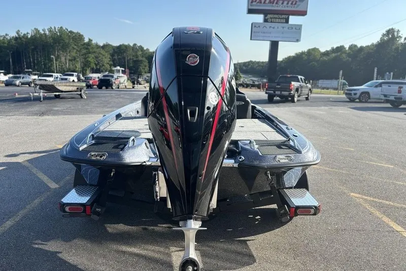 Slide: The Image of 2026 Phoenix 721 ZXL boat with powerful outboard motor in parking lot. - 4