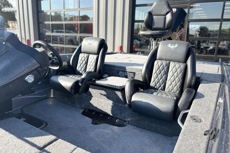 Slide: The Image of 2026 Phoenix 721 ZXL boat interior with luxurious black leather seats. - 8
