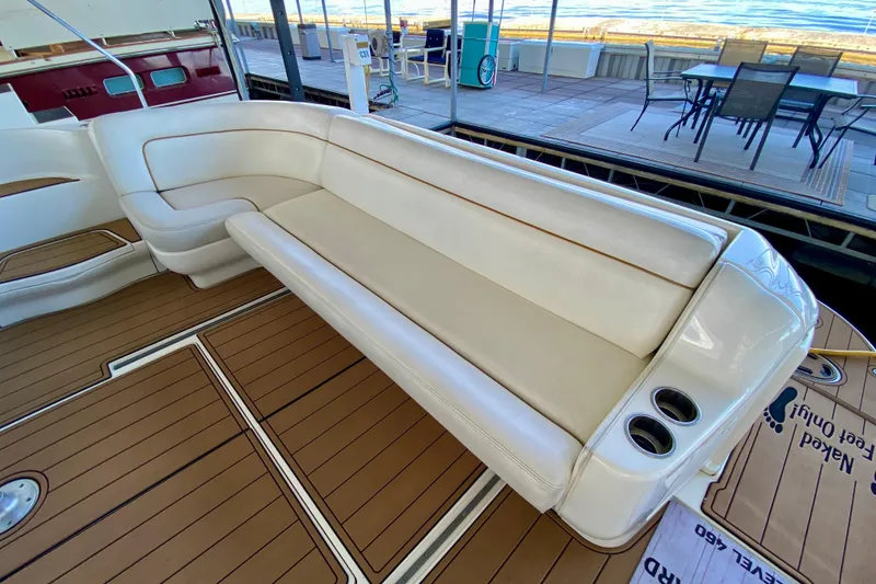 Slide: The Image of Luxurious seating on 1999 Sea Ray 460 Sundancer yacht with elegant wood flooring. - 12