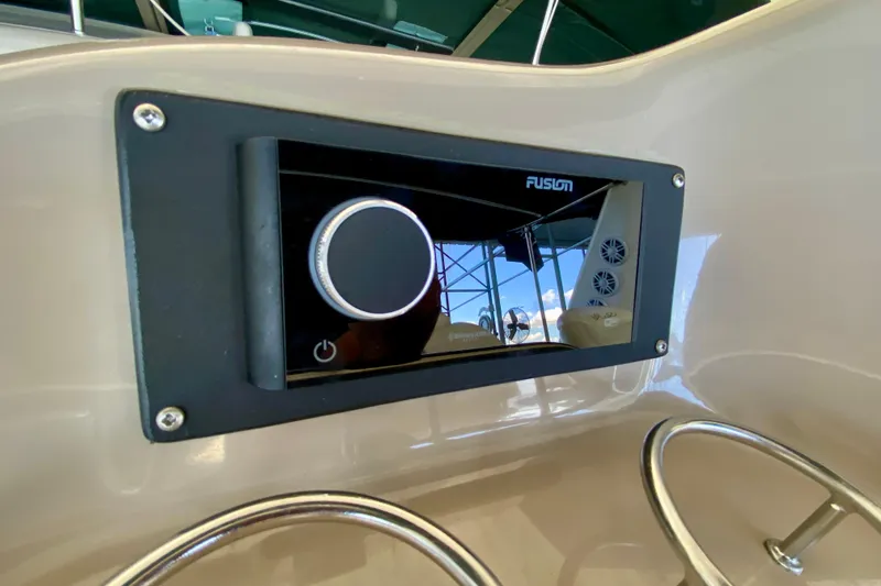 Slide: The Image of Fusion stereo system on 1999 Sea Ray 460 Sundancer yacht dashboard. - 21