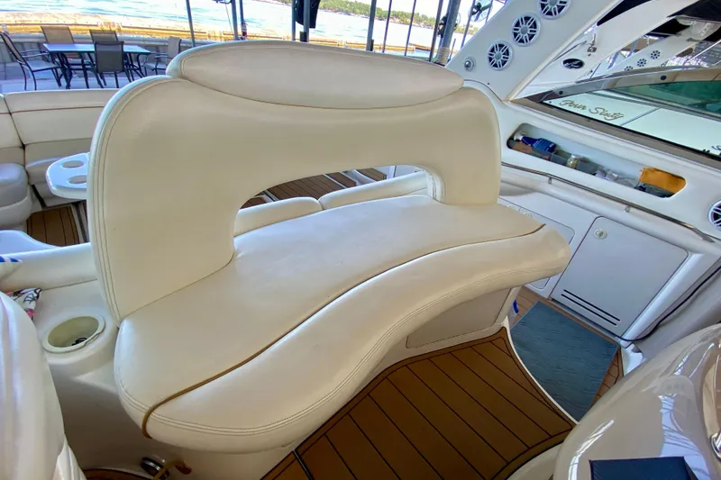 Slide: The Image of Luxurious interior seating of a 1999 Sea Ray 460 Sundancer yacht. - 25