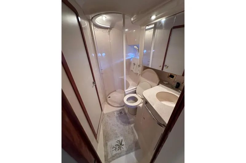 Slide: The Image of Luxurious bathroom in 1999 Sea Ray 460 Sundancer yacht with shower and vanity. - 30