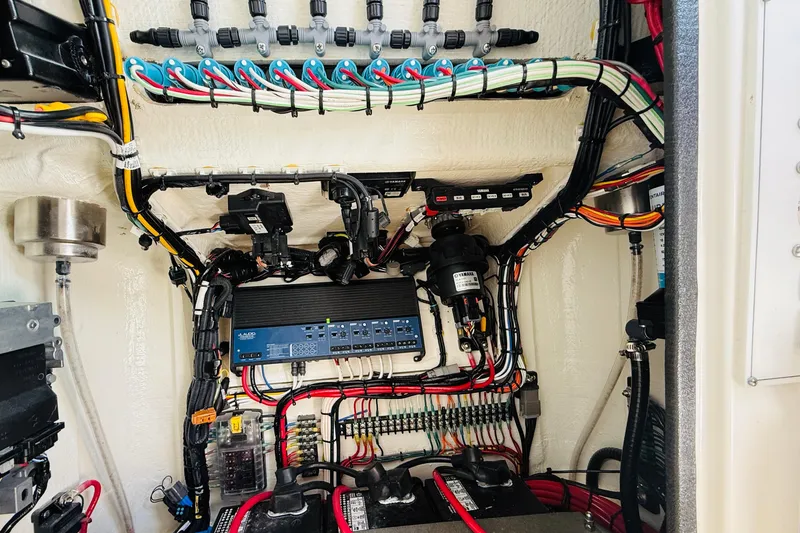 Slide: The Image of 2024 Contender 25 Open boat wiring and electrical system detail. - 4