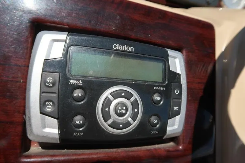 Slide: The Image of Clarion CMS1 stereo system in 2013 Berkshire 231RFCSTS13 boat dashboard. - 16