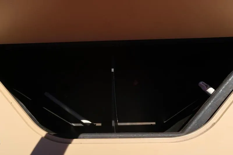 Slide: The Image of Open storage compartment of 2013 Berkshire 231RFCSTS13 boat. - 27