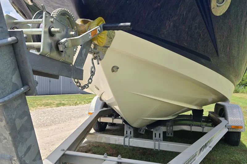 Slide: The Image of Chaparral 206 SSi 2010 boat on trailer, close-up of hull and winch mechanism. - 4