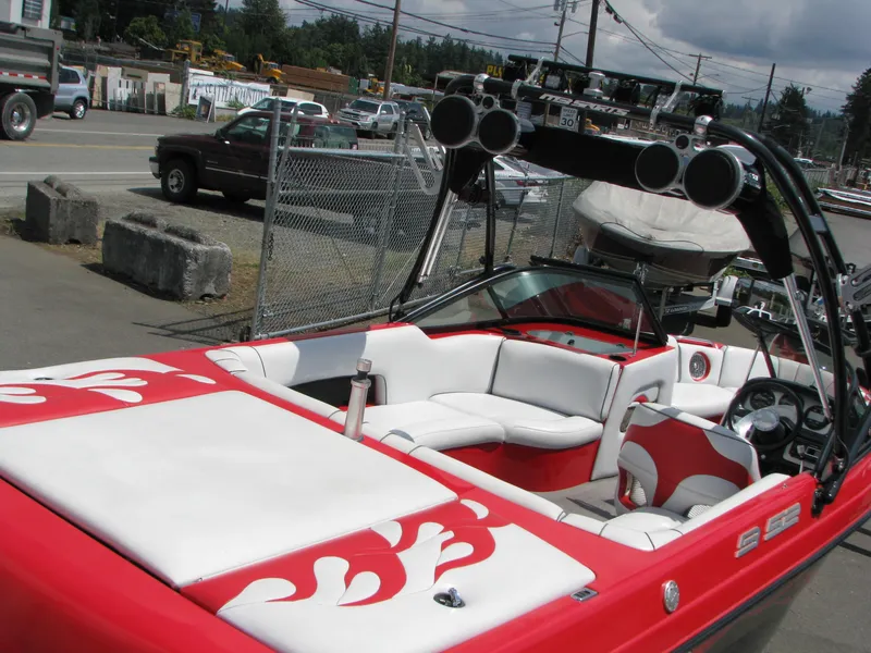 Slide: The Image of Red and white MB B52-21 V/SK boat, 2004 model, with speakers and seating. - 7