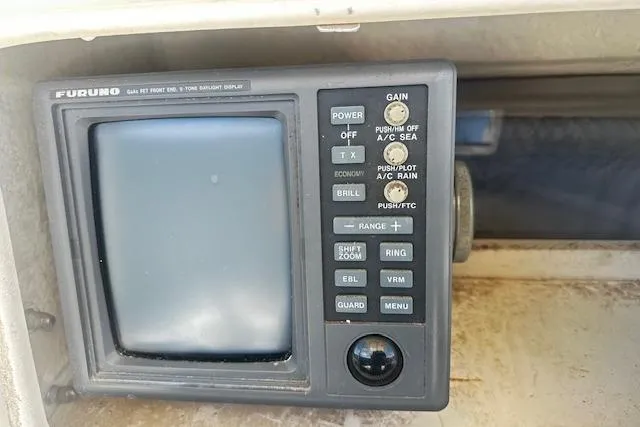 Slide: The Image of Furuno radar display on 1997 Sea Cat Catamaran, featuring various control buttons. - 10