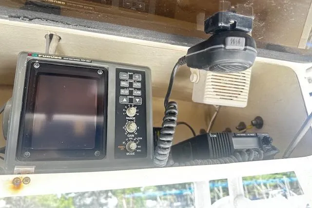 Slide: The Image of 1997 Sea Cat Catamaran navigation equipment with radio and display panel. - 11