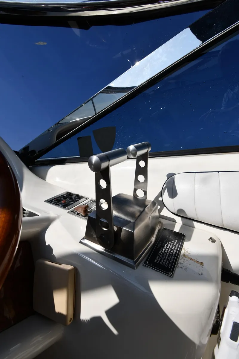 Slide: The Image of Control panel of a 1996 Sunseeker 55 CAMARGUE yacht with throttle levers. - 17