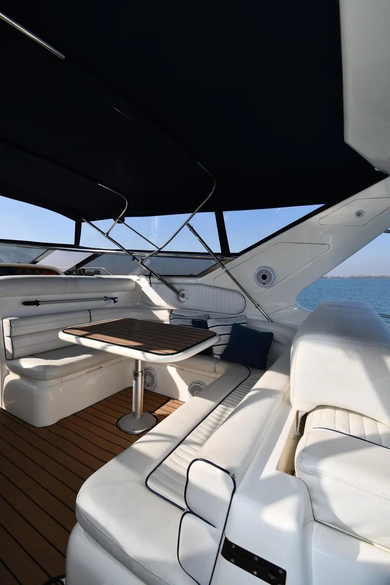 Slide: The Image of Luxurious 1996 Sunseeker 55 CAMARGUE yacht interior with elegant seating and table. - 25