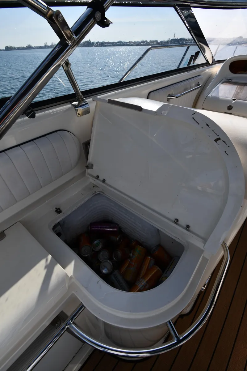 Slide: The Image of Sunseeker 55 CAMARGUE 1996 yacht with open cooler, filled with drinks, on deck. - 32