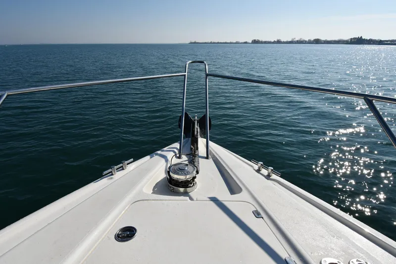 Slide: The Image of Bow view of 1996 Sunseeker 55 CAMARGUE yacht on calm sea. - 4