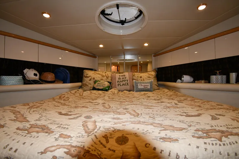 Slide: The Image of Luxurious cabin interior of 1996 Sunseeker 55 CAMARGUE yacht with cozy bedding and decor. - 40