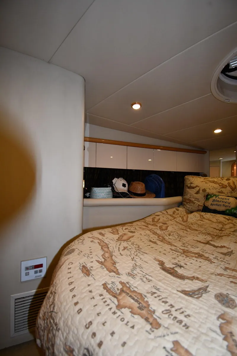 Slide: The Image of Interior cabin of 1996 Sunseeker 55 CAMARGUE with nautical-themed bedding. - 42