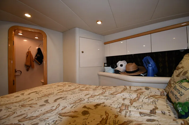 Slide: The Image of Interior cabin of 1996 Sunseeker 55 CAMARGUE yacht with cozy bed and storage. - 43