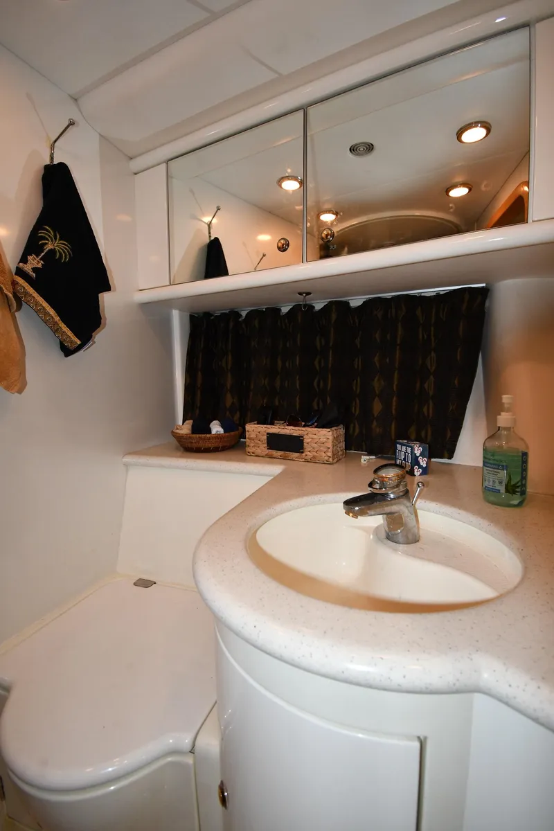 Slide: The Image of Bathroom interior of 1996 Sunseeker 55 CAMARGUE yacht with sink and storage. - 46
