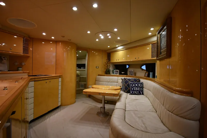 Slide: The Image of Luxurious interior of 1996 Sunseeker 55 CAMARGUE yacht with plush seating and ambient lighting. - 48