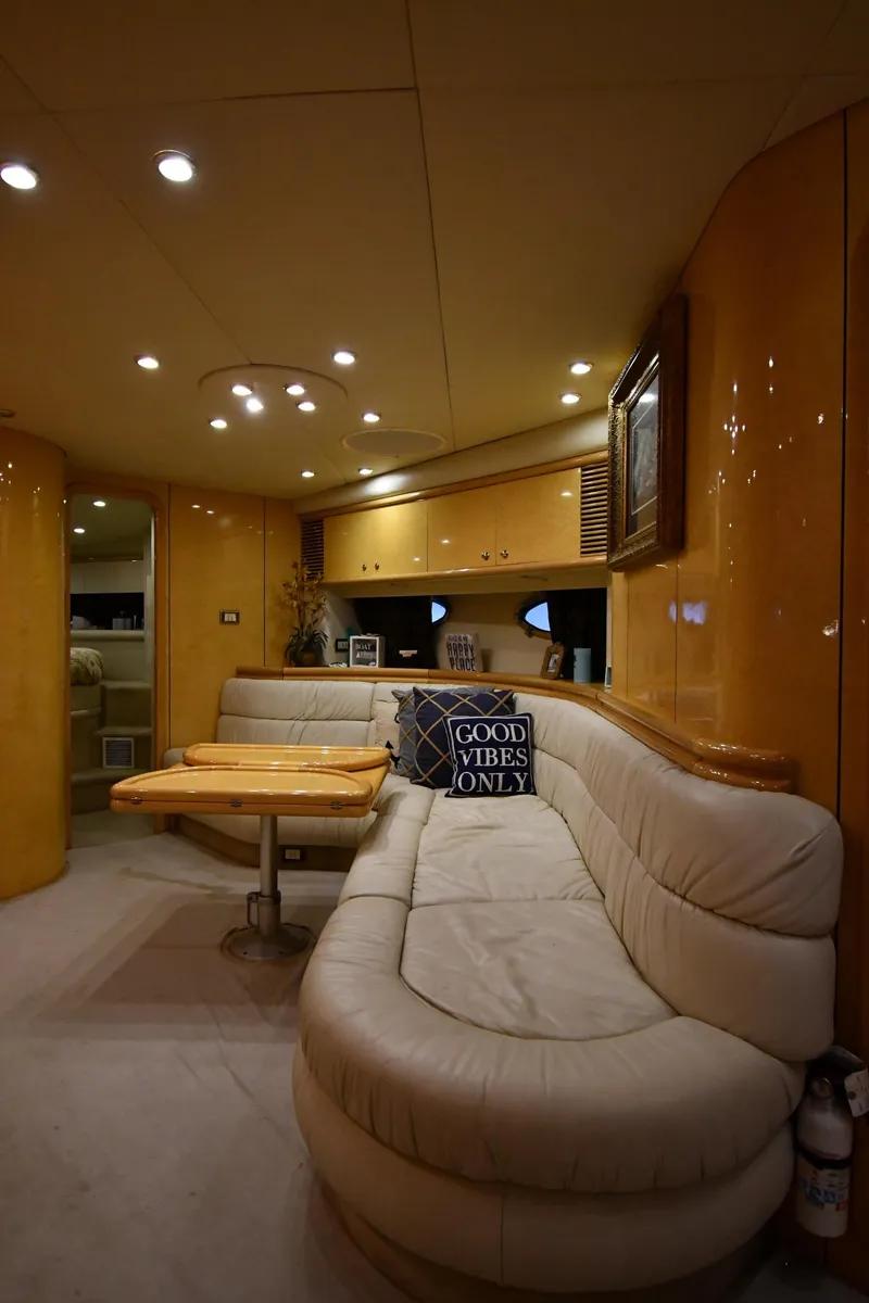 Slide: The Image of Luxurious interior of 1996 Sunseeker 55 CAMARGUE yacht with plush seating and ambient lighting. - 49