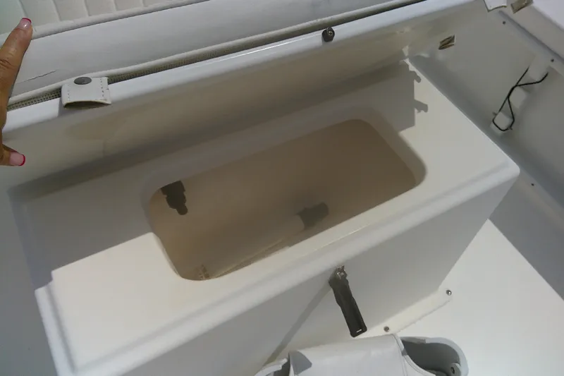 Slide: The Image of Open storage compartment on a 2008 KenCraft 2260 BAYRIDER boat. - 14