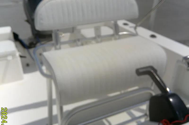 Slide: The Image of 2008 KenCraft 2260 BAYRIDER boat seat and control lever, close-up view. - 15