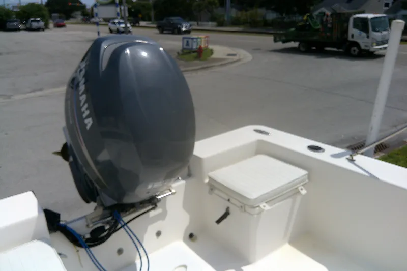 Slide: The Image of 2008 KenCraft 2260 BAYRIDER boat with Yamaha outboard motor in urban setting. - 17