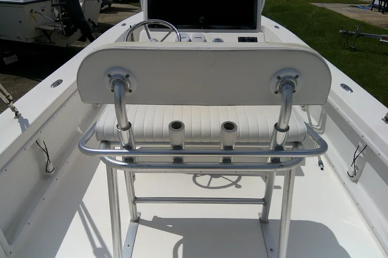 Slide: The Image of 2008 KenCraft 2260 BAYRIDER boat interior with steering wheel and seating. - 20