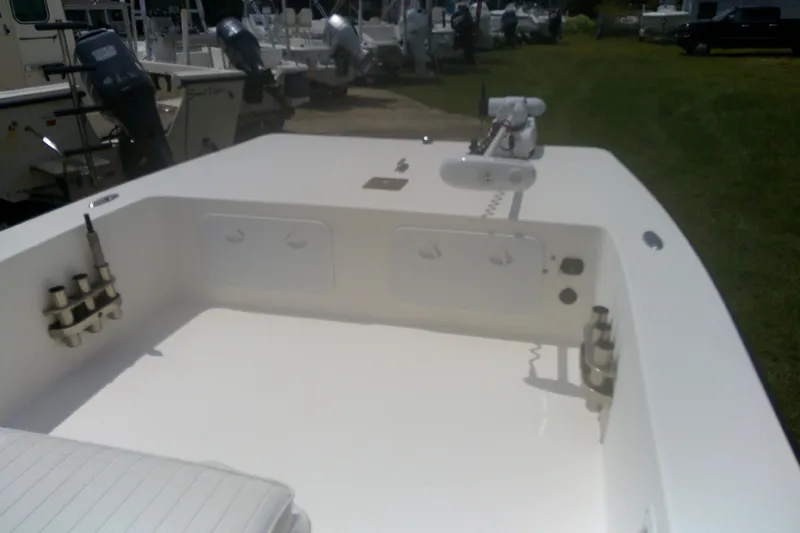 Slide: The Image of 2008 KenCraft 2260 BAYRIDER boat interior with rod holders and trolling motor. - 8