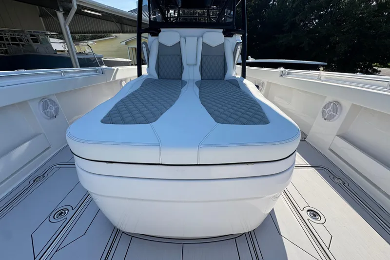 Slide: The Image of 2023 Invincible 35 Catamaran with luxurious seating and modern design. - 21