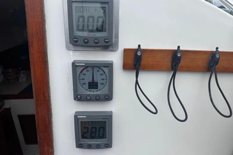 Slide: The Image of Instrument panel on 1984 Nonsuch 26 Classic sailboat with speed, wind, and depth gauges. - 15