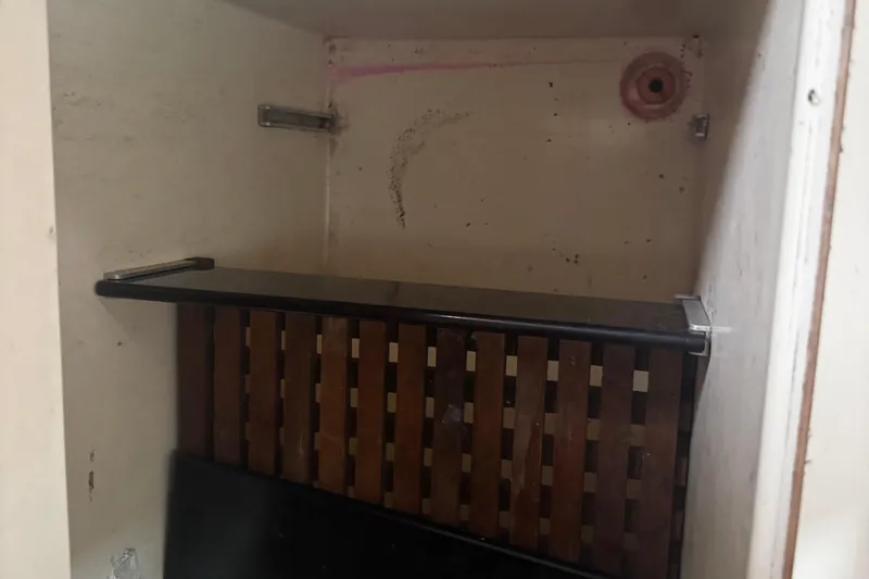 Slide: The Image of Interior storage space of a 1984 Nonsuch 26 Classic sailboat. - 27