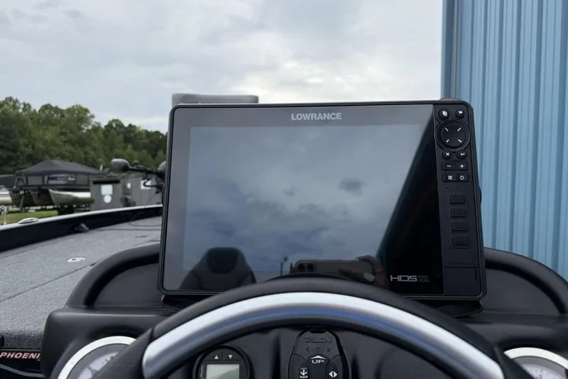 Slide: The Image of 2019 Phoenix 921 PRO XP boat dashboard with Lowrance HDS-12 display. - 13