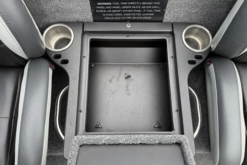 Slide: The Image of Interior of a 2019 Phoenix 921 PRO XP boat with cup holders and storage compartment. - 19