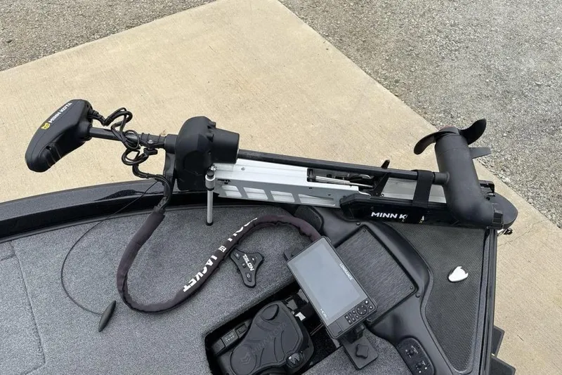 Slide: The Image of 2019 Phoenix 921 PRO XP boat with Minn Kota trolling motor and fish finder. - 4