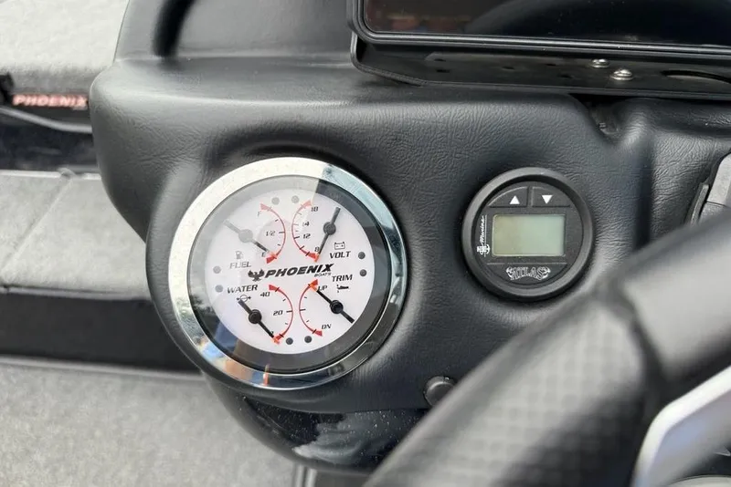 Slide: The Image of Dashboard of 2019 Phoenix 921 PRO XP boat with gauges and digital display. - 9