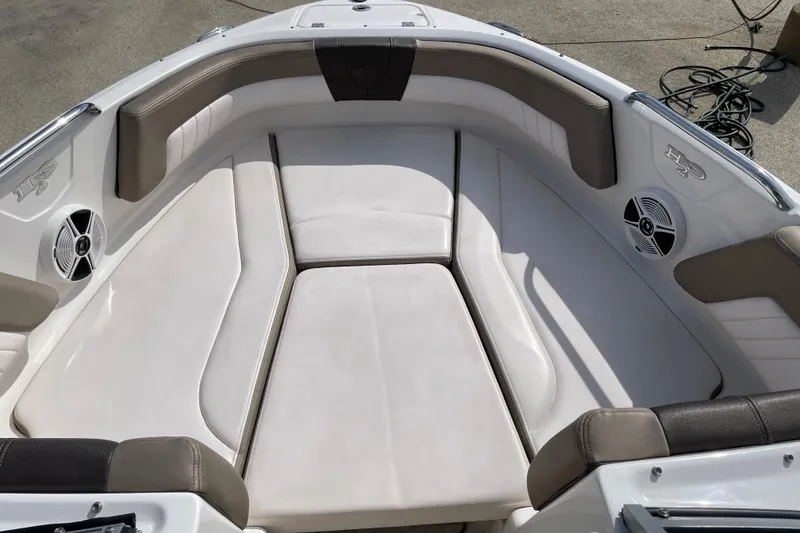 Slide: The Image of Outboard motor of 2019 Chaparral 21 H2O Sport boat on a stand. - 5