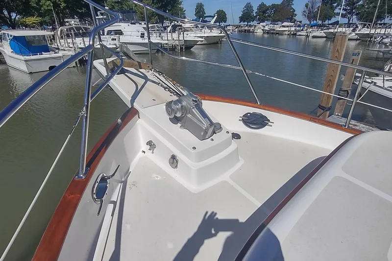 Slide: The Image of Bow view of 2001 Kadey-Krogen 39 yacht docked in a marina. - 11