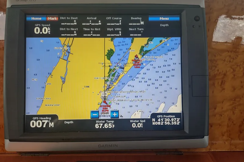 Slide: The Image of Garmin GPS display on a 2001 Kadey-Krogen 39, showing nautical chart and navigation details. - 46