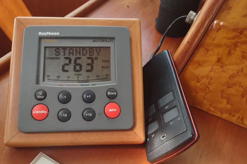 Slide: The Image of Raytheon autopilot display on 2001 Kadey-Krogen 39 boat, showing standby mode at 263 degrees. - 48