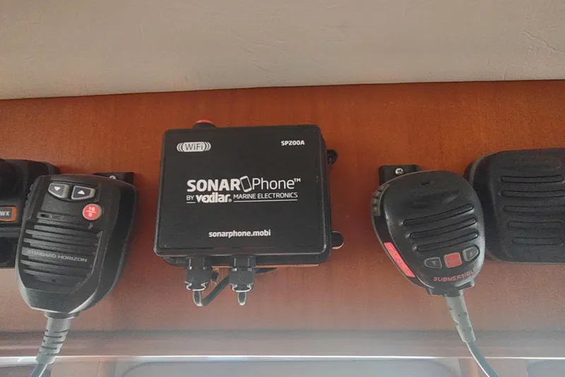 Slide: The Image of Marine electronics on a 2001 Kadey-Krogen 39, featuring SonarPhone and communication devices. - 50