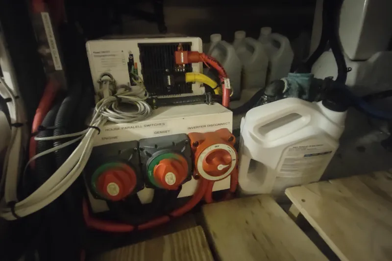 Slide: The Image of Electrical panel and switches in a 2001 Kadey-Krogen 39 boat engine room. - 82