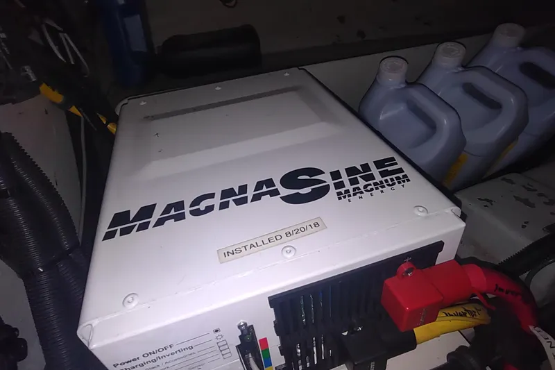 Slide: The Image of Magnum Energy inverter in 2001 Kadey-Krogen 39 boat engine room, installed 8/20/18. - 83