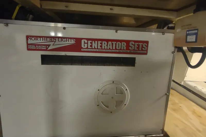 Slide: The Image of Northern Lights generator set on 2001 Kadey-Krogen 39 boat, diesel electric power system. - 84