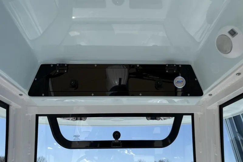 Slide: The Image of 2026 Sportsman Open 232 Center Console interior view, featuring sleek design and modern controls. - 12