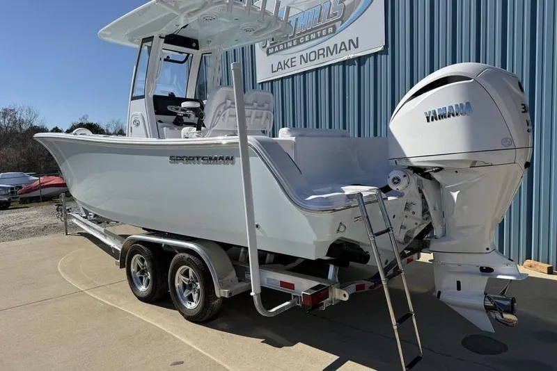 Slide: The Image of 2026 Sportsman Open 232 Center Console boat with Yamaha engine on trailer. - 15